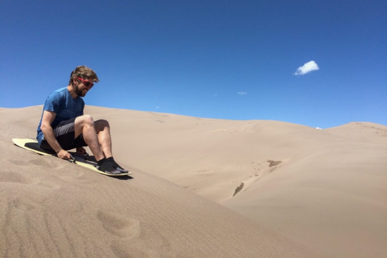 Sand sledding in Great Sand Dunes National Park, Colorado