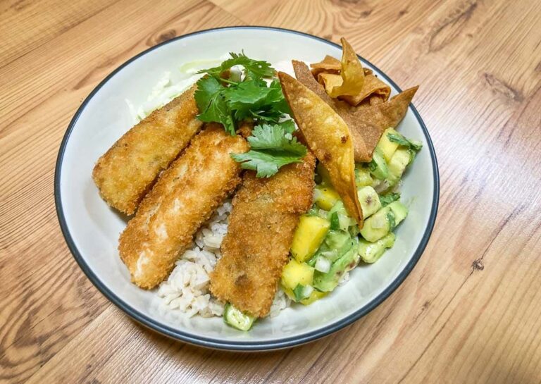 Fish taco bowl with mango avocado salsa and brown rice