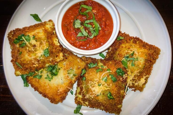 St. Louis style toasted ravioli recipe with marinara sauce on plate