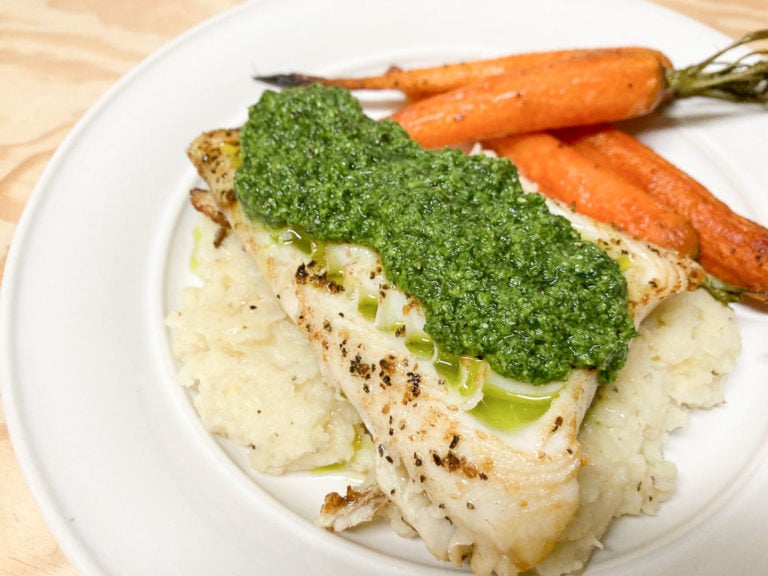 Pan-seared sablefish recipe with pureed celeriac, roasted baby carrots and carrot greens pesto