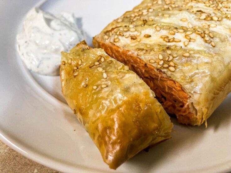 Salmon Wellington with sour cream sauce