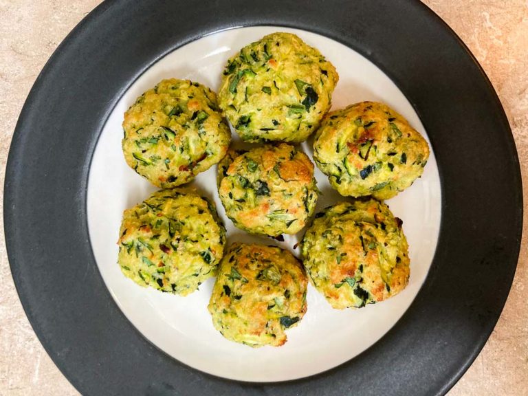 Baked zucchini summer squash balls on plate