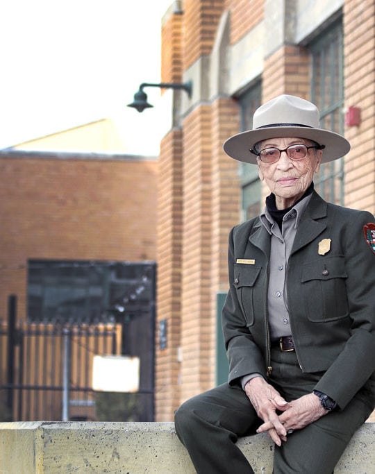 Ranger Betty Reid Soskin sits in front of the Rosie the Riveter Visitor Center Credit NPS Luther Bailey