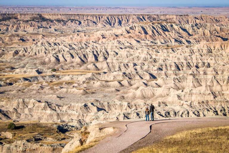 Pinnacles Overlook visitors looking at scenery in Badlands National Park