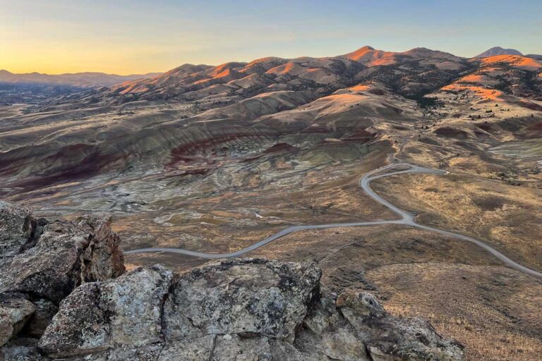 Carroll Rim Trail sunrise view of the Painted Hills at John Day Fossil Beds National Monument, Oregon