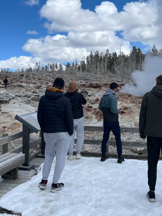 Man walks off trail at Steamboat Geyser in Yellowstone National Park - Image credit NPS