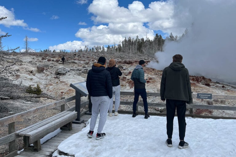 Man walks off trail at Steamboat Geyser in Yellowstone National Park - Image credit NPS