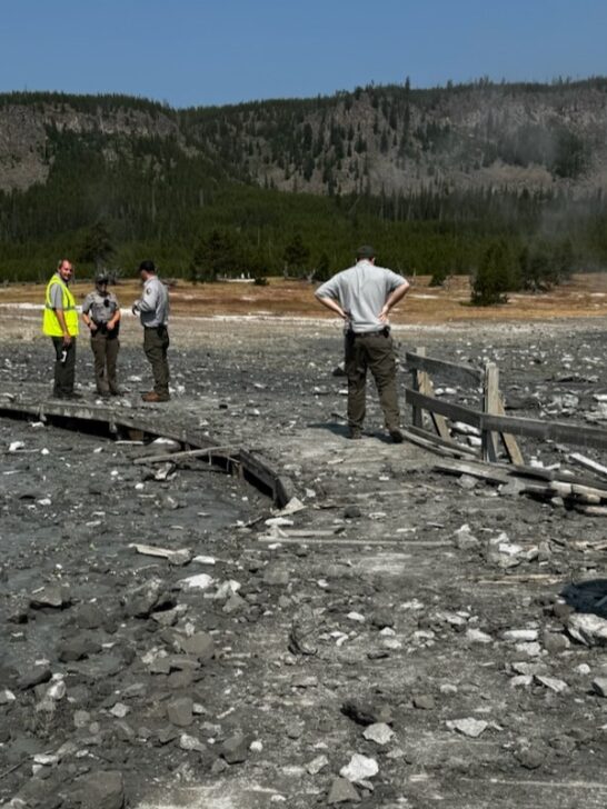 Staff assess damage on the boardwalk after hydrothermal explosion at Biscuit Basin in Yellowstone National Park - Image credit: NPS